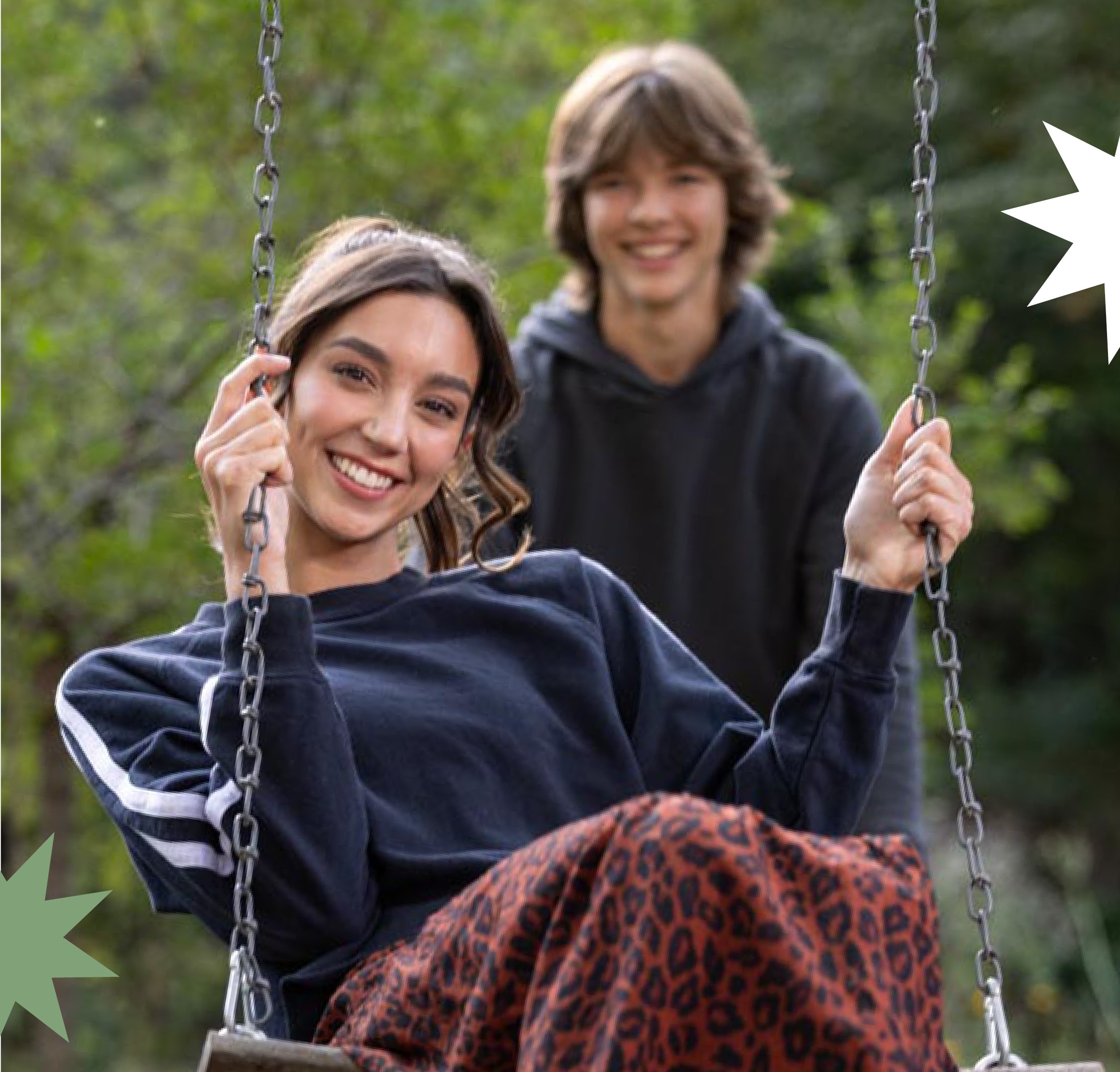 GUY PUHING GIRL ON SWING